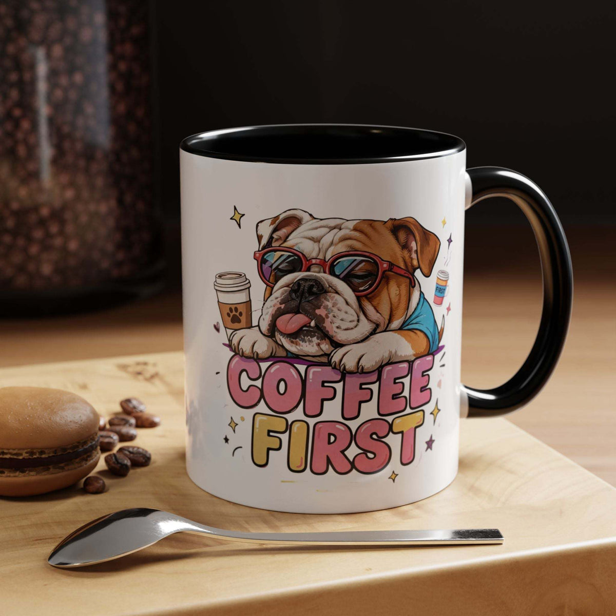 Bulldog Coffee Mug with glossy white ceramic, black interior and handle, bulldog illustration, and “COFFEE FIRST” lettering