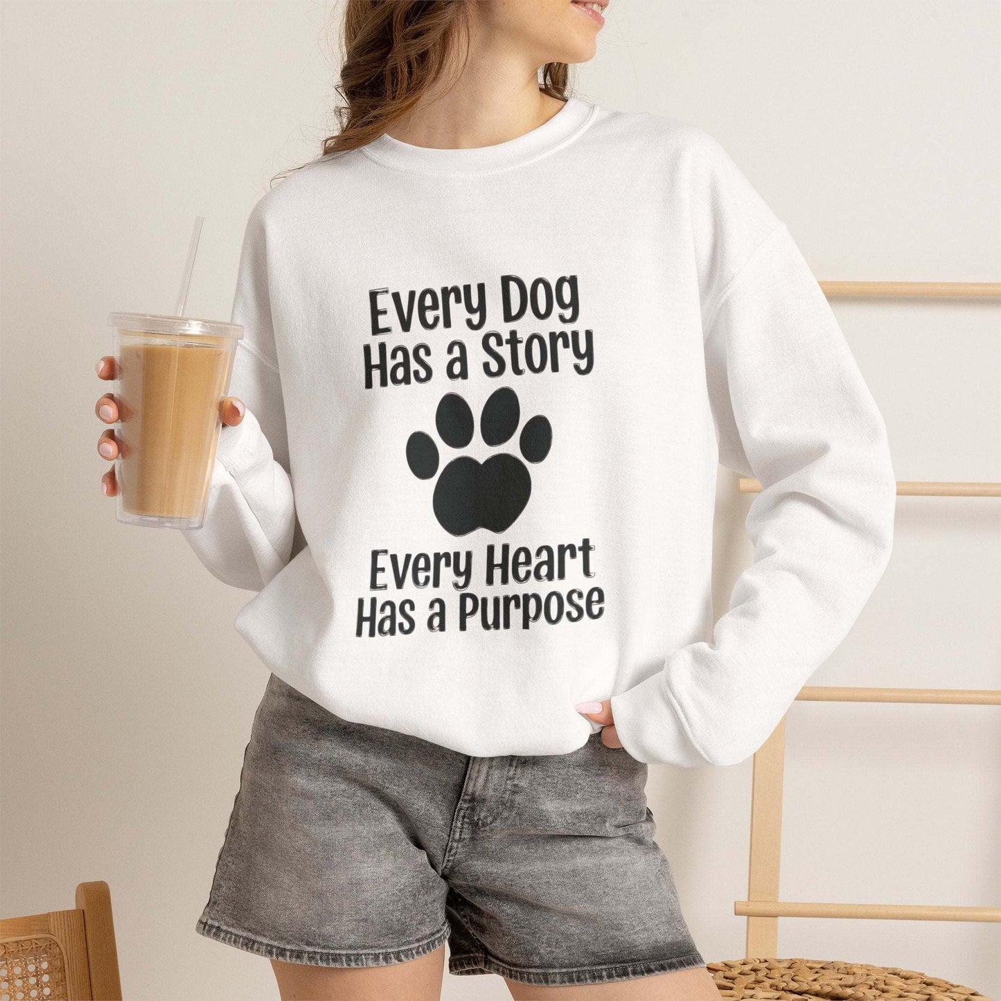 unisex every dog has a story sweatshirt with paw print and message