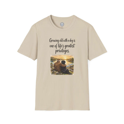 Growing Old with a Dog T-Shirt in light beige cotton, with script lettering and a sunset illustration of a person embracing a dog