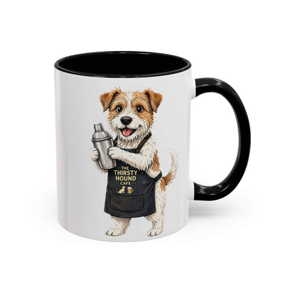 Jack Russell Barista Dog mug, white ceramic with a black handle and interior, showing an apron-wearing dog holding a shaker