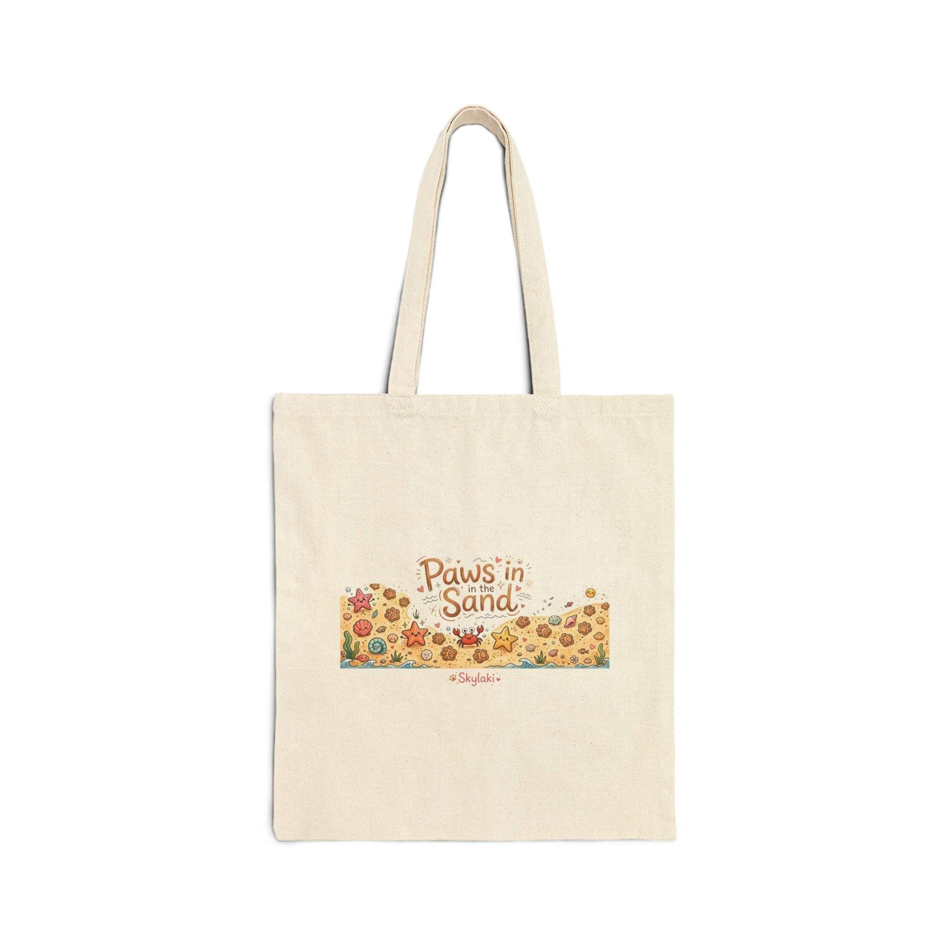 Paws In the Sand Dog beach Tote with paw prints and seashells on natural canvas